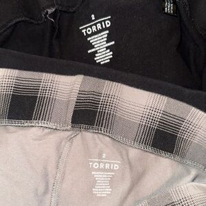 Torrid size 2, 2-pack capri leggings with designs